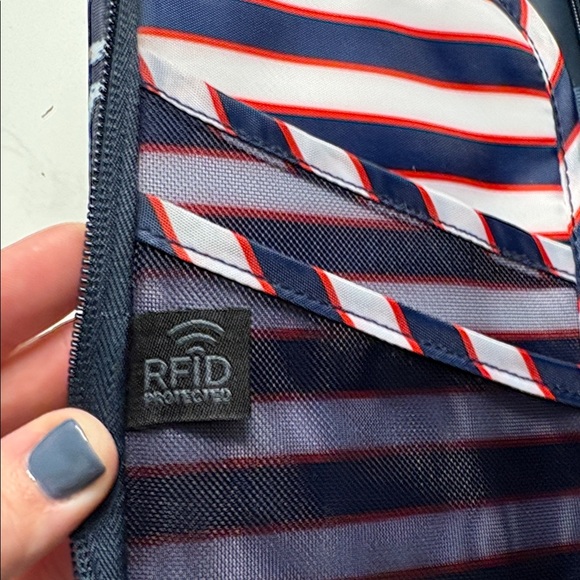 This is a Lug Tango SE Travel RFID Wallet in the Waves Blue pattern - Picture 3 of 4